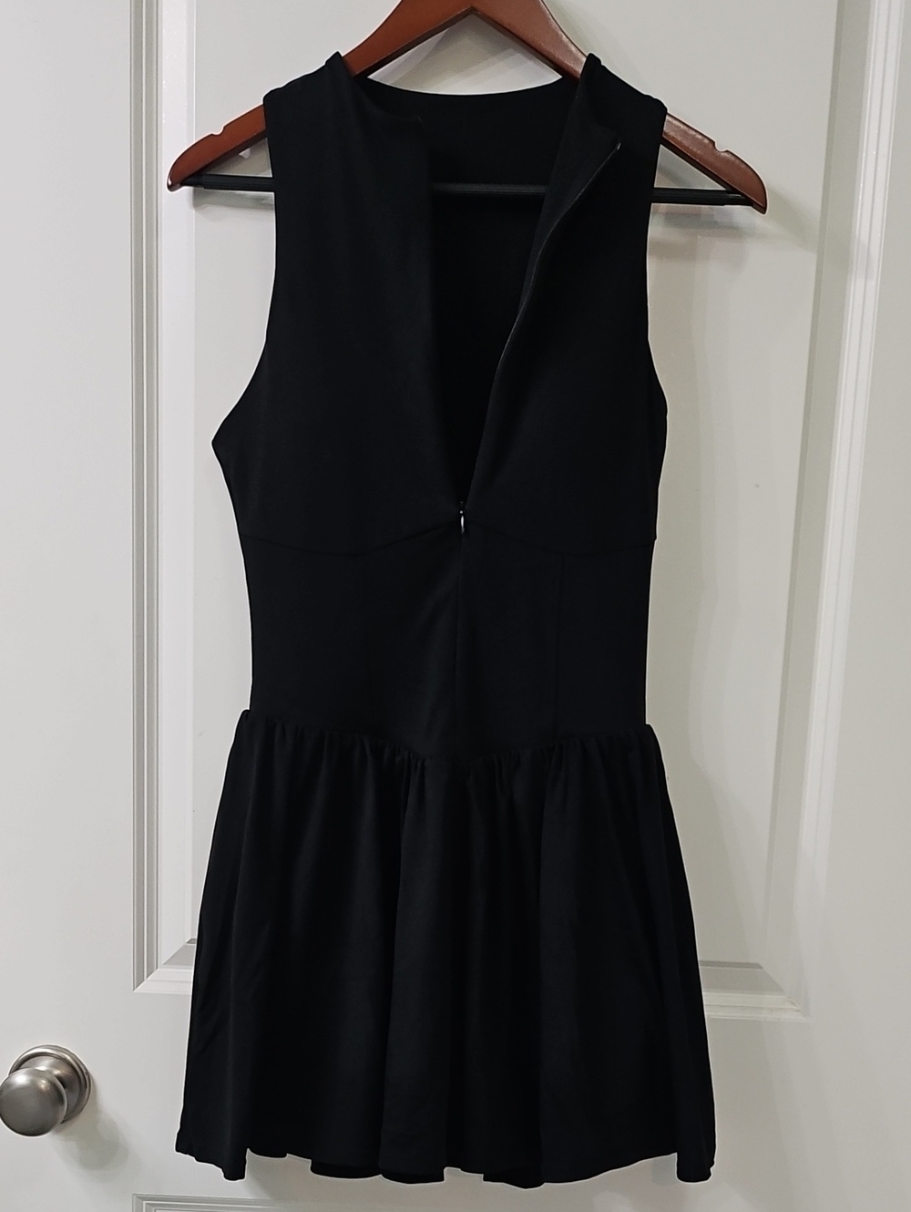 Sleeveless Black Mini Dress with Flared Hem